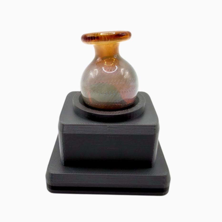 Single cap holder with silicone insert that protects glass caps, by Dabdock